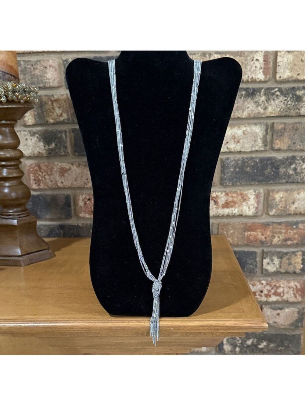 NY&CO silver tone 7 strand long tassel necklace